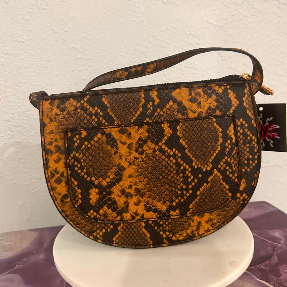 Olivia Miller “Anastasia” half moon cross body bag in orange and black NWT